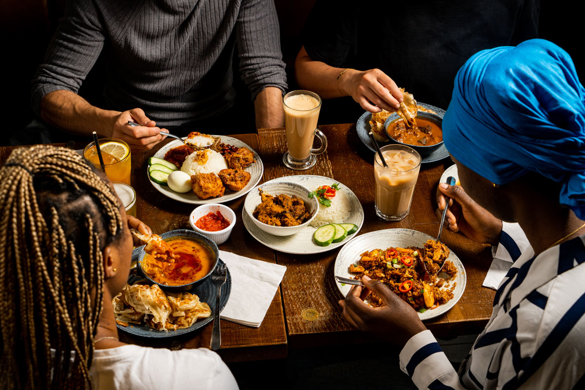 Table of four with food and drink